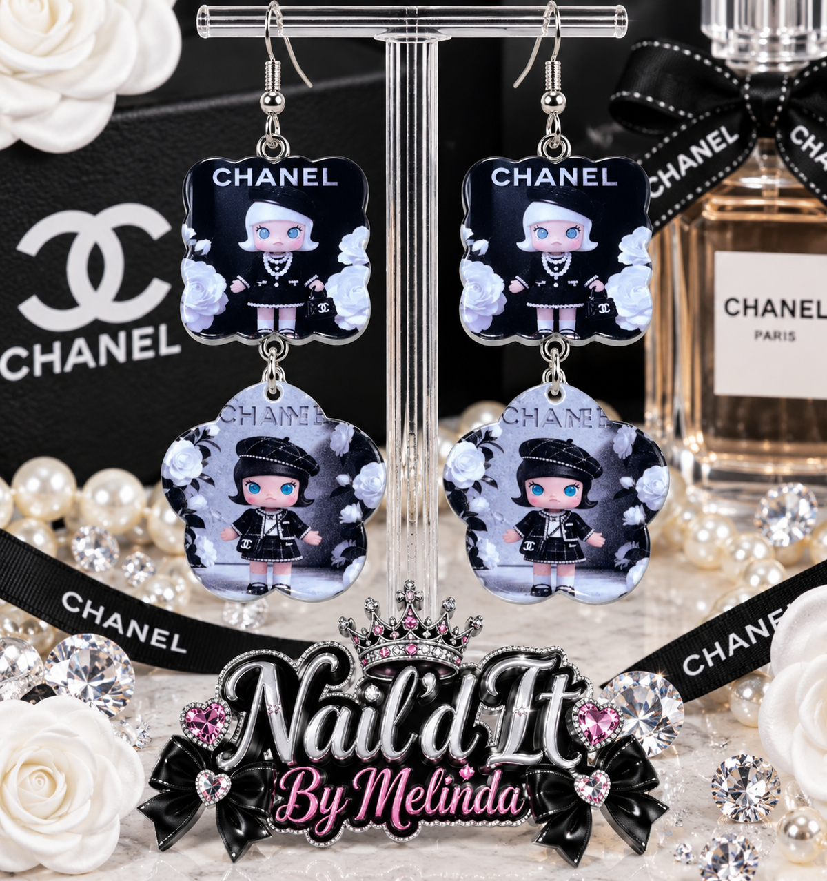Chanel Inspired Fashion Doll Double Dangle Earrings on display stand with Chanel backdrop