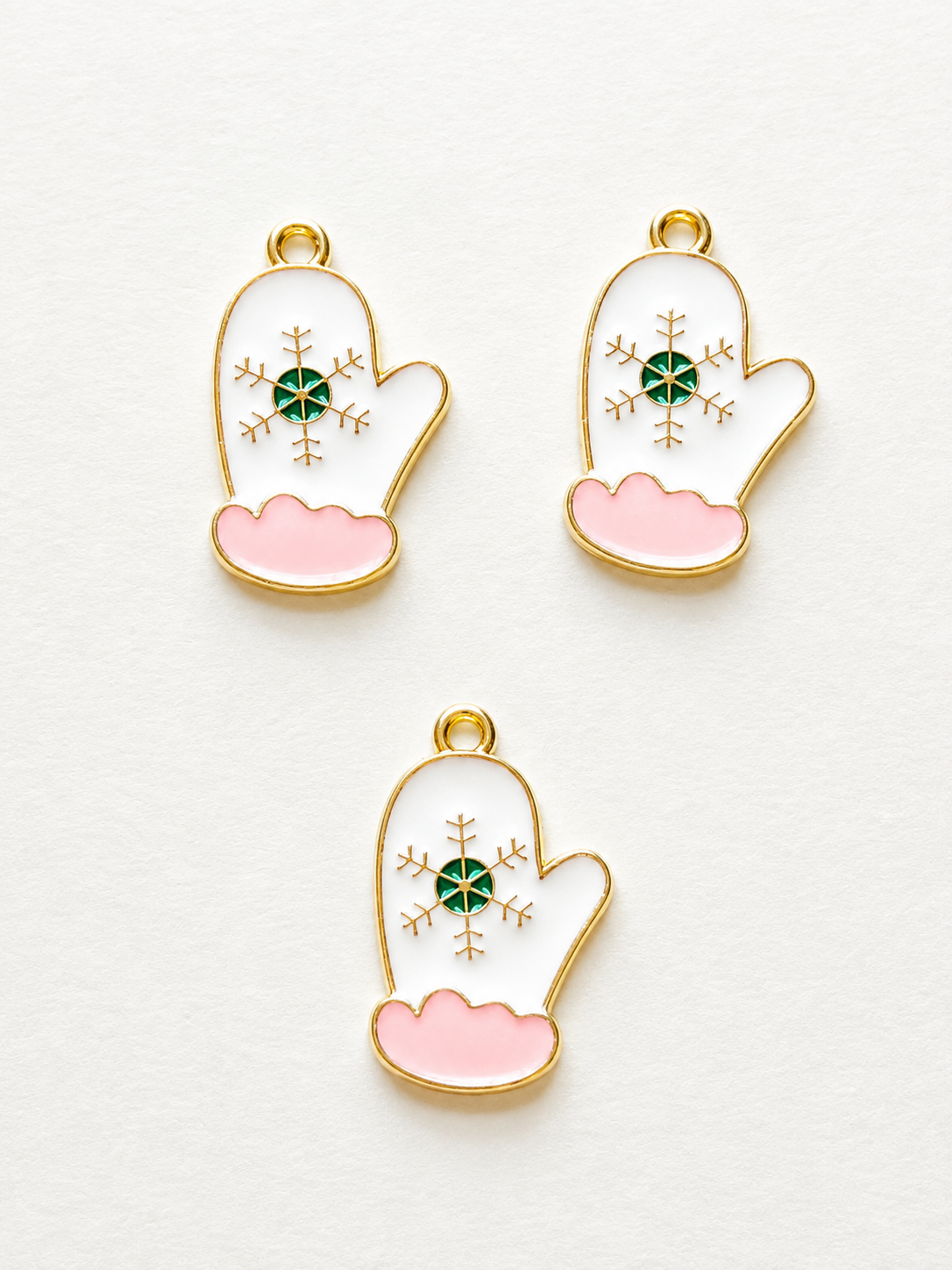 White and pink enamel winter mitten with green snowflake crystal earring and necklace set