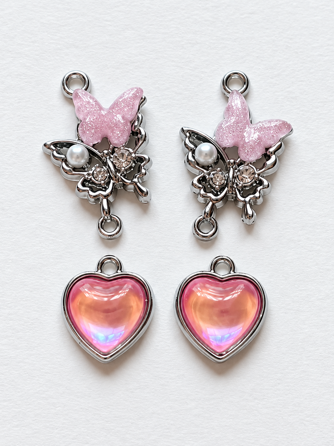 Pink Butterfly & Iridescent Heart Drop Earrings – Pink with a Purpose