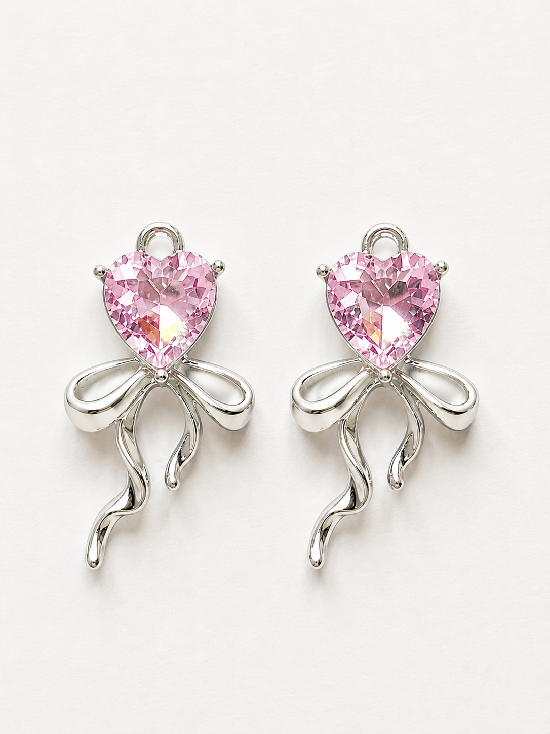 Pink heart crystal bow ribbon drop earrings in silver