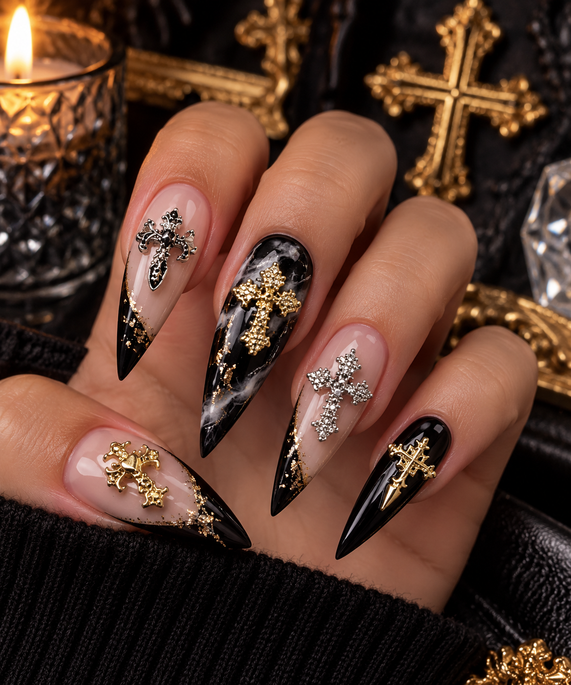 Gothic Cross Nail Charms styled on black marble stiletto nails with gold and silver cross accents