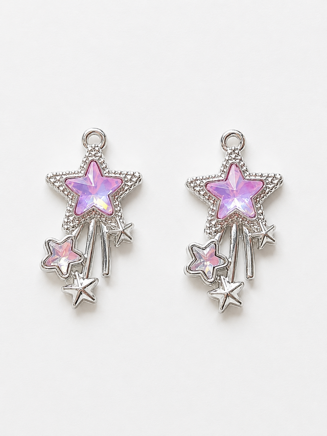 Purple iridescent shooting star cluster earrings with dangling star drops