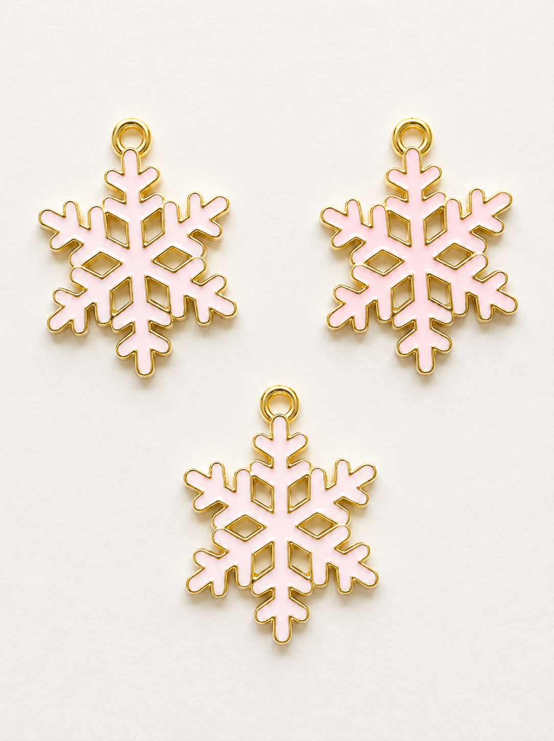 Pink enamel open snowflake earring and necklace set with gold border