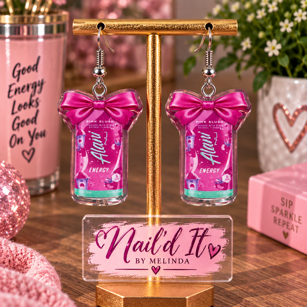 Alani Nu Pink Slush energy dangle earrings on display stand – lifestyle shot