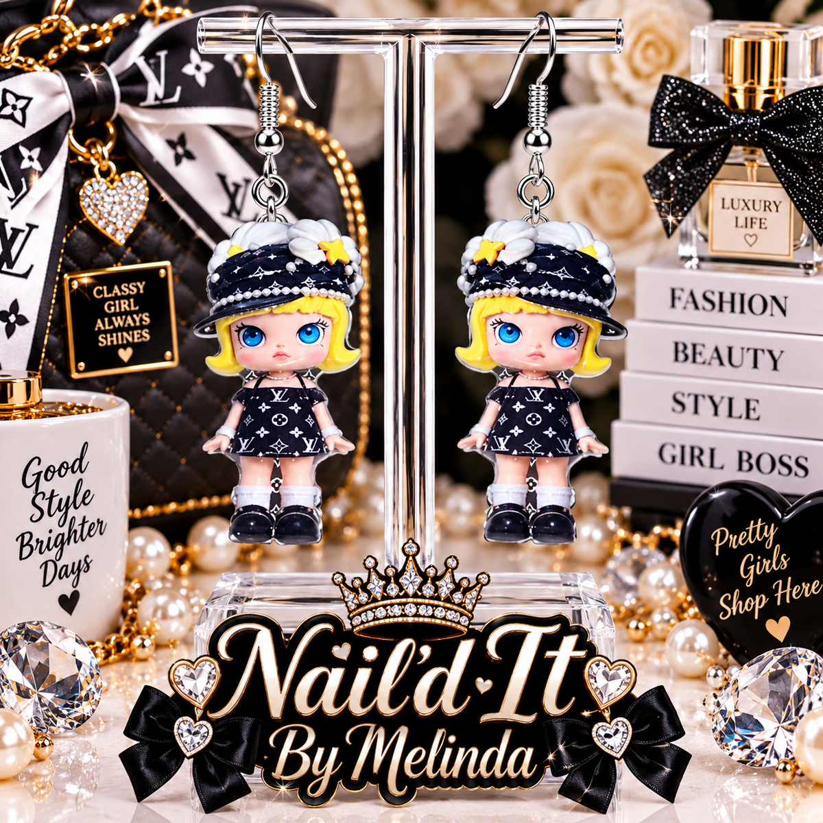 Luxury Life Blonde Fashion Doll LV Inspired Dangle Earrings on display stand with black gold backdrop