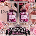 Dior Paris Pink Peony Perfume Bottle Dangle Earrings on display stand with Dior pink rose backdrop