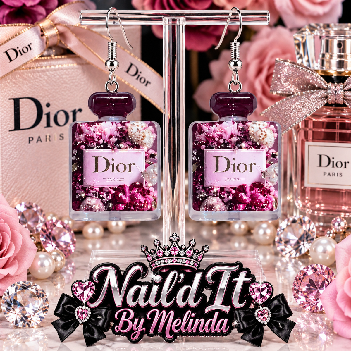 Dior Paris Pink Peony Perfume Bottle Dangle Earrings on display stand with Dior pink rose backdrop