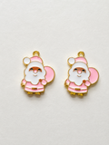 Pink enamel full body Santa Claus with gift bag earrings gold border
