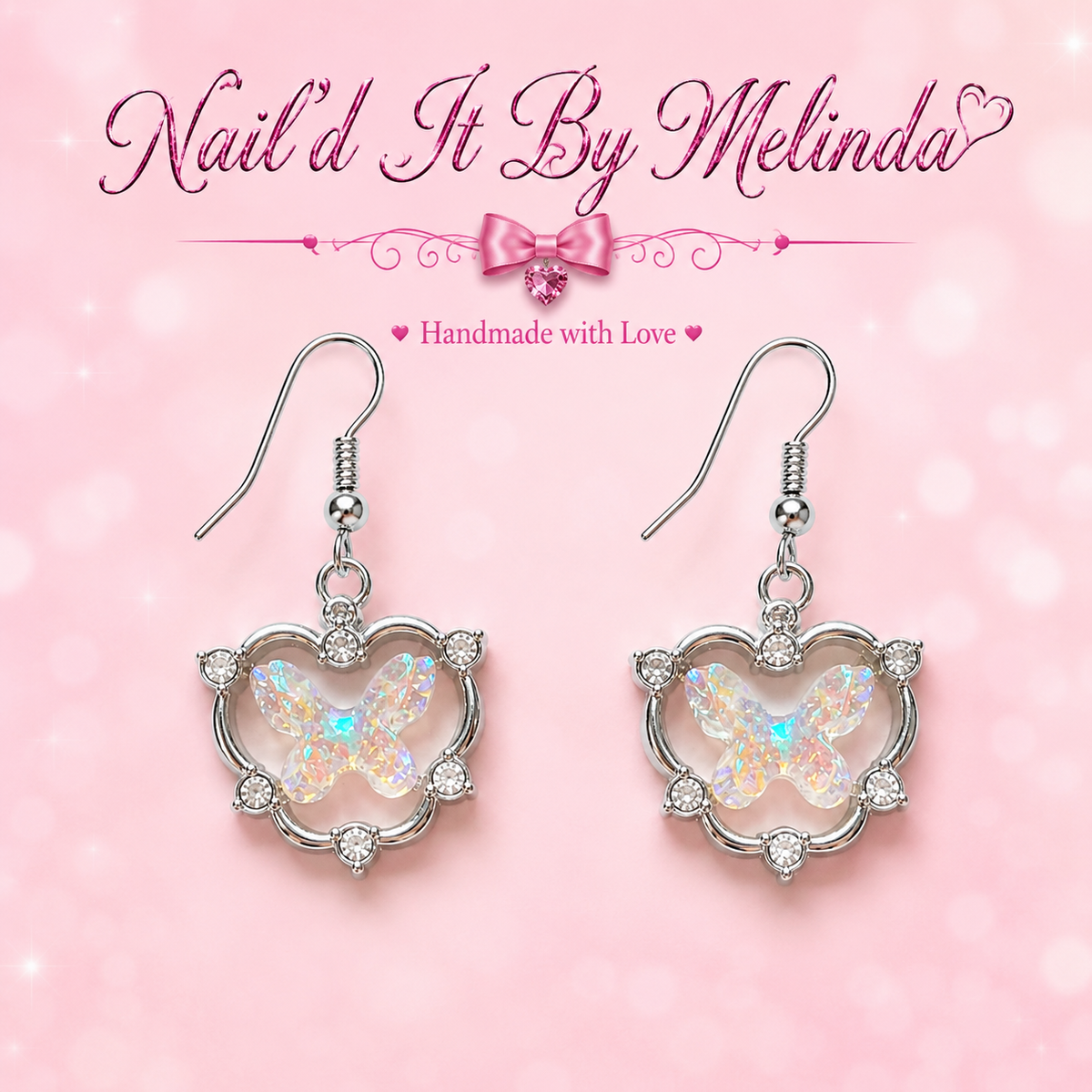 Iridescent aurora butterfly in silver scalloped heart frame earrings