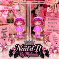 Classy & Fabulous Pink Fashion Doll LV Inspired Dangle Earrings on display stand with pink rose backdrop