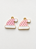 Pink enamel Santa hat earrings with gold stars and white trim