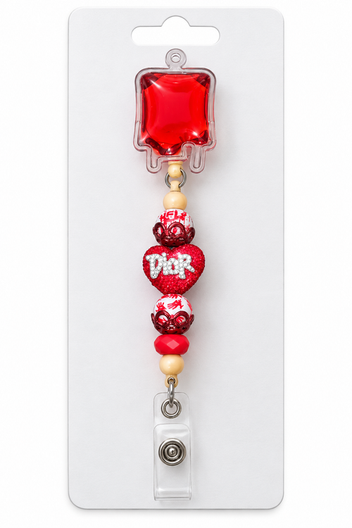 Red blood bag retractable badge reel with red and white beads and a sparkling red heart centerpiece