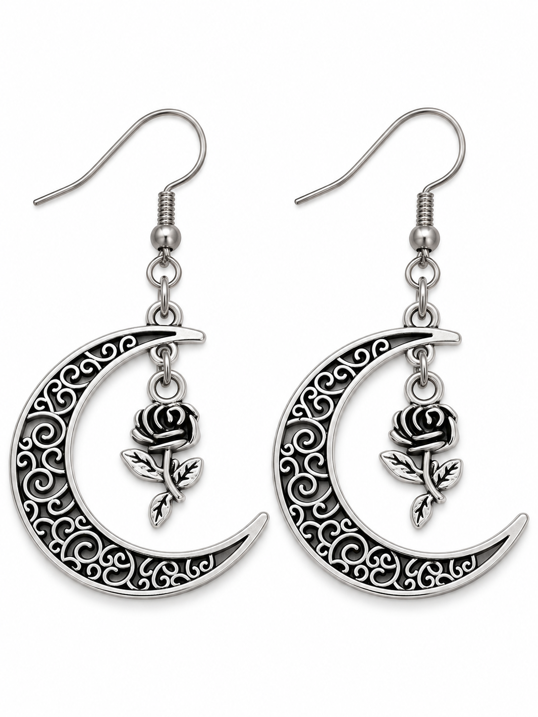 Brushed nickel crescent moon earrings with dark filigree swirls and dangling rose charms