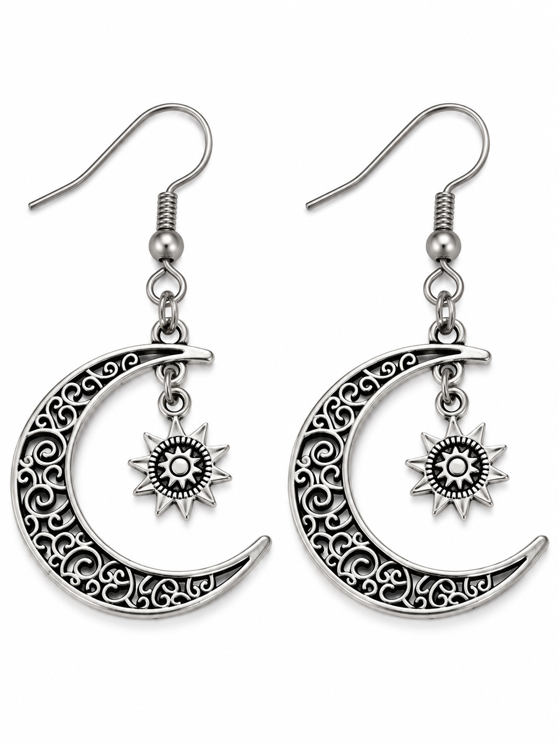 Brushed nickel crescent moon earrings with dark filigree swirls and dangling sun charms