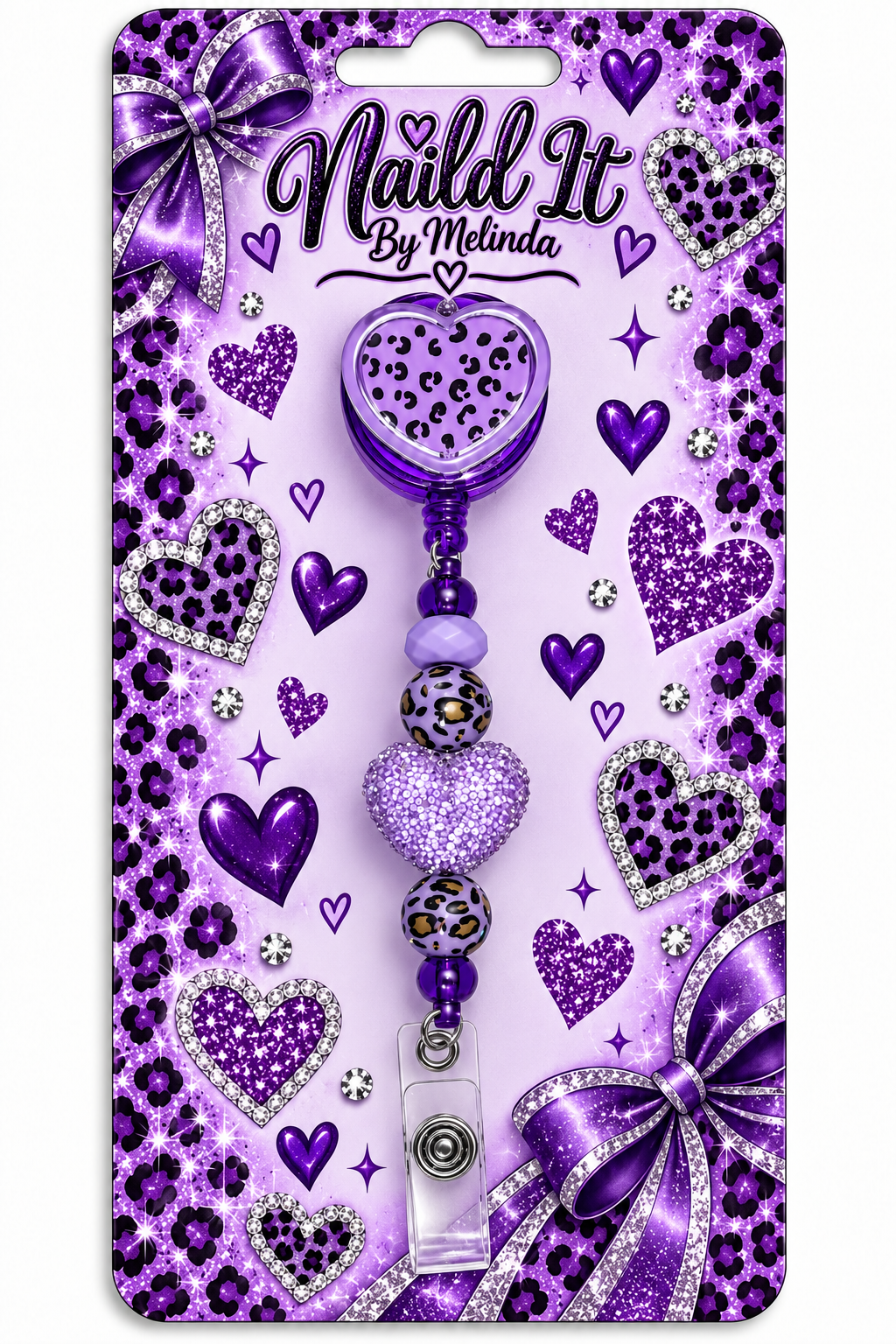 Handmade purple leopard heart badge reel on Nail'd It By Melinda branded packaging