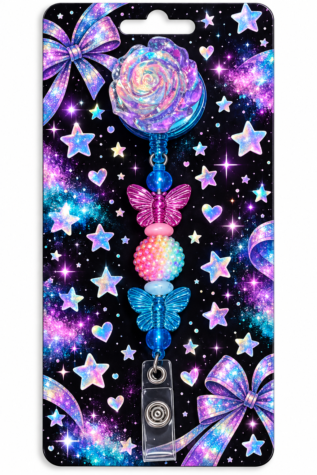 Rainbow rose and butterfly badge reel displayed on a sparkling galaxy-themed backing card